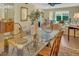 Inviting living room with lots of natural light, comfortable seating, and stylish decor at 3401 Stonehaven E Ct # A, Palm Harbor, FL 34684