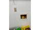 Close-up of electrical outlet in the unfinished basement at 35118 Whispering Oaks Blvd, Dade City, FL 33523
