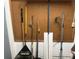 Garage with pegboard wall and various gardening tools at 35118 Whispering Oaks Blvd, Dade City, FL 33523