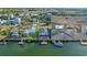 Waterfront home with a dock in a coastal community, complemented by an inviting interior living space at 3515 Centavo Ct, Hernando Beach, FL 34607