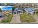 Charming home with waterfront access and deck. Ideal for relaxing and entertaining near the water at 3515 Centavo Ct, Hernando Beach, FL 34607