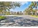 Circular drive leads up to the building entrance with surrounding landscaping and parking areas at 3819 Brooksworth Ave, Tarpon Springs, FL 34688