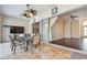 Cozy patio features a ceiling fan, tiled flooring, and sliding glass doors to the interior at 3819 Brooksworth Ave, Tarpon Springs, FL 34688