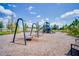 Community playground featuring swings and a multi-level play structure, ideal for Gathering fun and recreation at 3953 Northern Key Dr, Plant City, FL 33563