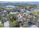 Aerial view of the property in a desirable neighborhood near a body of water at 410 Georgia Ave, Crystal Beach, FL 34681