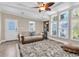 Bright living room with comfortable seating and lots of natural light at 410 Georgia Ave, Crystal Beach, FL 34681