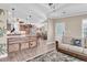 Spacious open-concept living room and kitchen featuring modern decor and a large island at 410 Georgia Ave, Crystal Beach, FL 34681