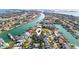 Aerial view of the neighborhood in a coastal community with beautiful waterways and boating access at 436 3Rd N Ave, Tierra Verde, FL 33715