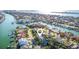 Aerial view showcasing a waterfront community with stunning canal views and neighborhood layout at 436 3Rd N Ave, Tierra Verde, FL 33715