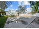 Spacious basketball court in a private backyard, perfect for sports and outdoor activities at 436 3Rd N Ave, Tierra Verde, FL 33715