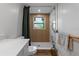 Close up of the updated bathroom featuring walk-in shower and modern fixtures at 4944 28Th S Ave, Gulfport, FL 33707