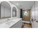 Updated bathroom featuring walk-in shower and double sink vanity with modern fixtures at 4944 28Th S Ave, Gulfport, FL 33707