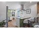 Modern kitchen features stainless steel appliances and a cozy breakfast bar at 4944 28Th S Ave, Gulfport, FL 33707