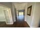 Inviting foyer with hardwood floors leading to the bright living area at 514 Cedar Woods Dr, Oldsmar, FL 34677