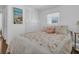 Bedroom with natural light, closet, and decor at 807 Saint Charles Dr, Tarpon Springs, FL 34689