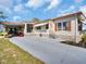 Well maintained single-Gathering home with spacious carport and tidy landscaping at 807 Saint Charles Dr, Tarpon Springs, FL 34689