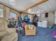 Open space with seating, bikes and washer/dryer at 807 Saint Charles Dr, Tarpon Springs, FL 34689