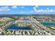 Captivating aerial view of a Primary-planned community with multiple ponds, baseball field and well-maintained homes and landscaping at 924 Peregrine Hill Pl, Ruskin, FL 33570