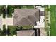An aerial view of the roof and patio with lounge area, dining area and nicely landscaped yard at 924 Peregrine Hill Pl, Ruskin, FL 33570