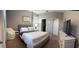 Cozy bedroom with plush carpet, neutral paint, and natural light from the window at 924 Peregrine Hill Pl, Ruskin, FL 33570
