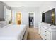 Serene bedroom with a walk-in closet and an attached bathroom at 924 Peregrine Hill Pl, Ruskin, FL 33570