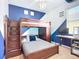 This bedroom features bunk beds, a desk, and plenty of storage space at 924 Peregrine Hill Pl, Ruskin, FL 33570