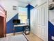 bedroom with desk and closet, featuring a unique color scheme and modern design at 924 Peregrine Hill Pl, Ruskin, FL 33570