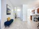 Spacious entryway with tile flooring, console table, and front door view at 924 Peregrine Hill Pl, Ruskin, FL 33570