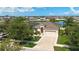 Charming single-Gathering home with a well-manicured lawn, beautiful landscaping, and a two-car garage at 924 Peregrine Hill Pl, Ruskin, FL 33570