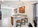 Eat in kitchen featuring granite counters, stainless steel appliances, and tile floor at 924 Peregrine Hill Pl, Ruskin, FL 33570