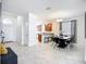 Open-concept layout with a kitchen and dining area, showcasing the bright space at 924 Peregrine Hill Pl, Ruskin, FL 33570