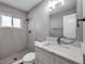 Updated bathroom with a new vanity and shower at 9915 39Th N St # 3, Pinellas Park, FL 33782