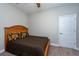 Bedroom with neutral carpeting and simple decor creates a relaxing atmosphere at 10428 Arbor Groves Pl, Riverview, FL 33578