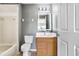 Modern bathroom with a lighted mirror, vanity, and a tiled shower/tub combination at 1208 Chatham Pine Pl, Brandon, FL 33511