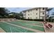 Community shuffleboard courts perfect for recreation and relaxation in this tranquil outdoor setting at 1235 S Highland Ave # 1-204, Clearwater, FL 33756