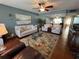 Inviting living room featuring comfortable seating, stylish decor, and ample lighting at 1235 S Highland Ave # 1-204, Clearwater, FL 33756