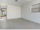 Garage space with concrete block construction and a screened entry door at 12400 Park Blvd # 524, Seminole, FL 33772