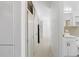 Bright hallway featuring plenty of storage space with lots of natural light leading to an on-suite bathroom at 12400 Park Blvd # 524, Seminole, FL 33772
