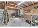 Barn interior featuring exposed rafters and a storage area at 13607 Mcintosh Rd, Thonotosassa, FL 33592