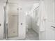 Clean bathroom featuring a walk-in shower with glass door and a separate toilet area for added privacy at 18 Crescent S Pl, St Petersburg, FL 33711