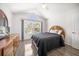Inviting bedroom with large windows and a vaulted ceiling offers abundant natural light at 18 Crescent S Pl, St Petersburg, FL 33711