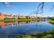 Scenic waterfront homes boast lush landscaping and tranquil lake views at 18 Crescent S Pl, St Petersburg, FL 33711