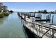 Modern marina dock with sturdy railings providing secure access and picturesque water views of the community at 18 Crescent S Pl, St Petersburg, FL 33711