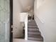 Inviting home entryway with tiled floors and wooden stairs, a coat closet and more at 18 Crescent S Pl, St Petersburg, FL 33711