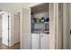 Laundry room with white washer and dryer, with easy access to two additional storage closets at 18 Crescent S Pl, St Petersburg, FL 33711
