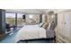 Bright main bedroom with a lake view and an ensuite bathroom at 18 Crescent S Pl, St Petersburg, FL 33711