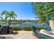 Relaxing patio area offers serene views of the lake and fountain at 18 Crescent S Pl, St Petersburg, FL 33711