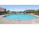 Relaxing community pool overlooking the peaceful lake at 18 Crescent S Pl, St Petersburg, FL 33711
