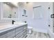 Stylish bathroom with a unique vanity, glass-enclosed shower, and modern fixtures at 18530 Gulf Blvd, Indian Shores, FL 33785
