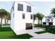 Beautiful home featuring dark trim and a convenient two-car garage at 18530 Gulf Blvd, Indian Shores, FL 33785